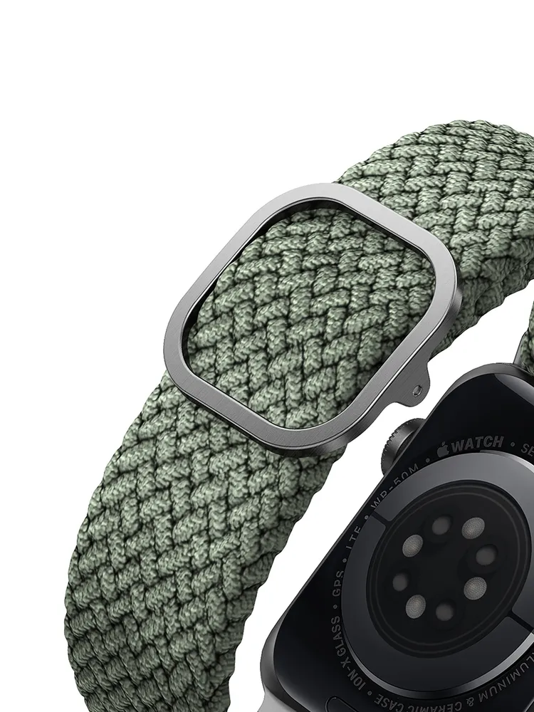На фото изображено Ремешок текстильный плетёный Uniq для Apple Watch 38/40/41/42, зелёный