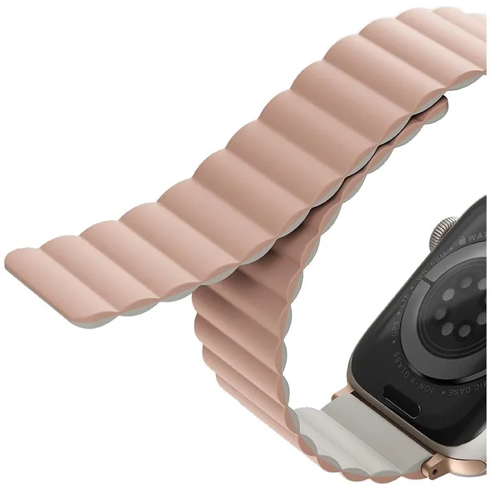 На фото изображено Ремешок силиконовый двусторонний Uniq для Apple Watch (44,45,46,49 мм), розовый-бежевый